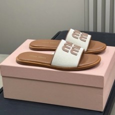 미우미우 캔버스 슬라이드 뮬 슬리퍼