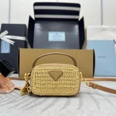 프라다 우븐 원단 및 가죽 미니 파우치 1NR025